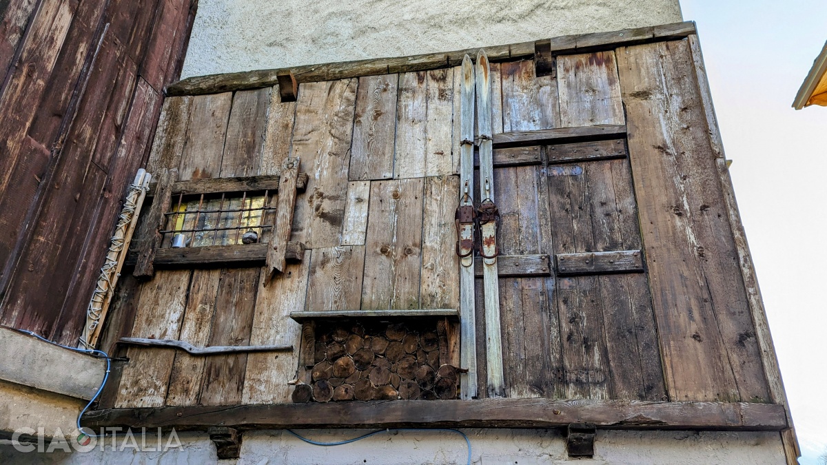 Old wooden skis decorate the upper floors of the houses.