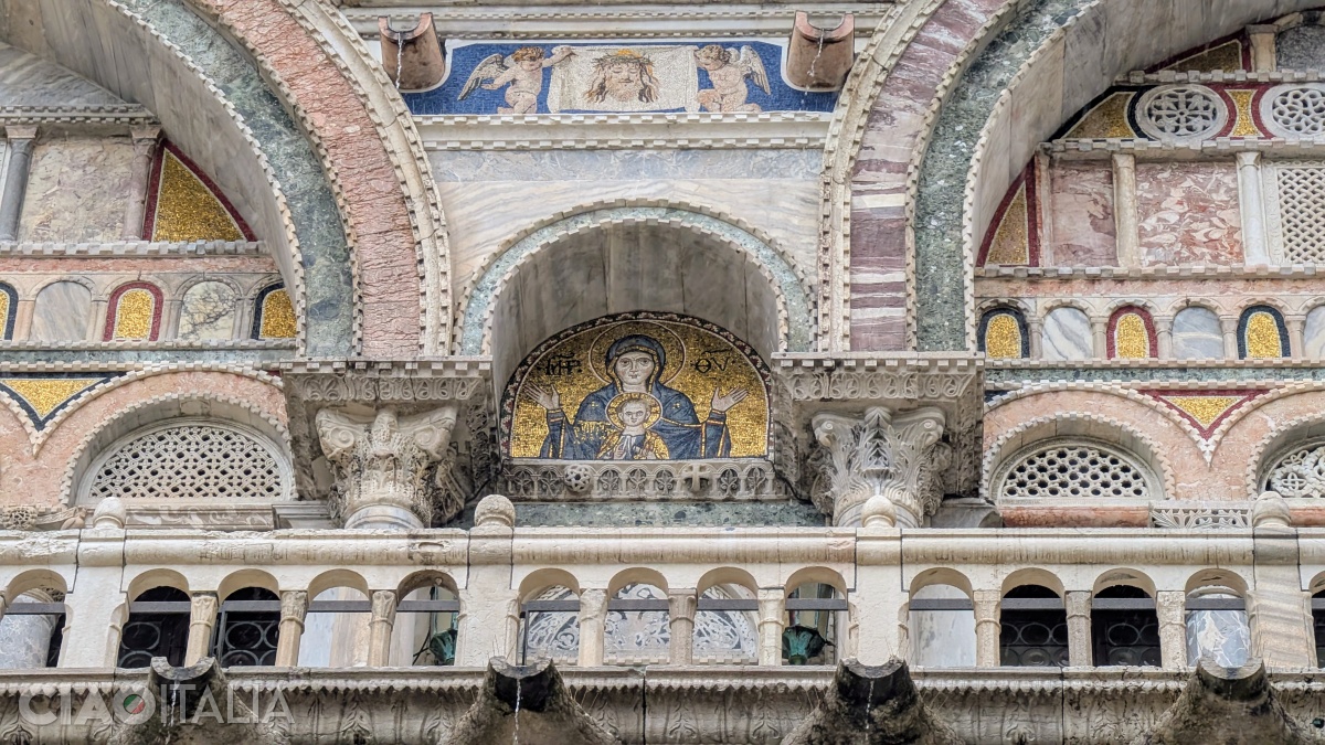 The mosaic of the Virgin is located under the Gothic turret in the center of the south façade.
