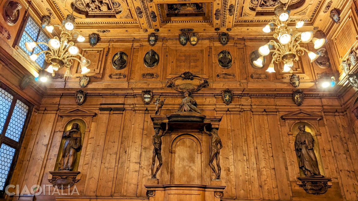 The "Cattedra degli Spellati" is located on the right wall as you enter the hall.