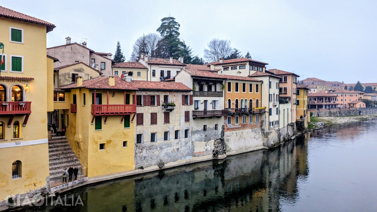 The houses rise right above the water.