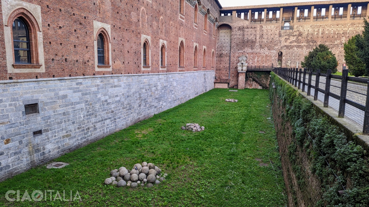 Only the base of the gray stone walls remains from the 14th-century fortress.