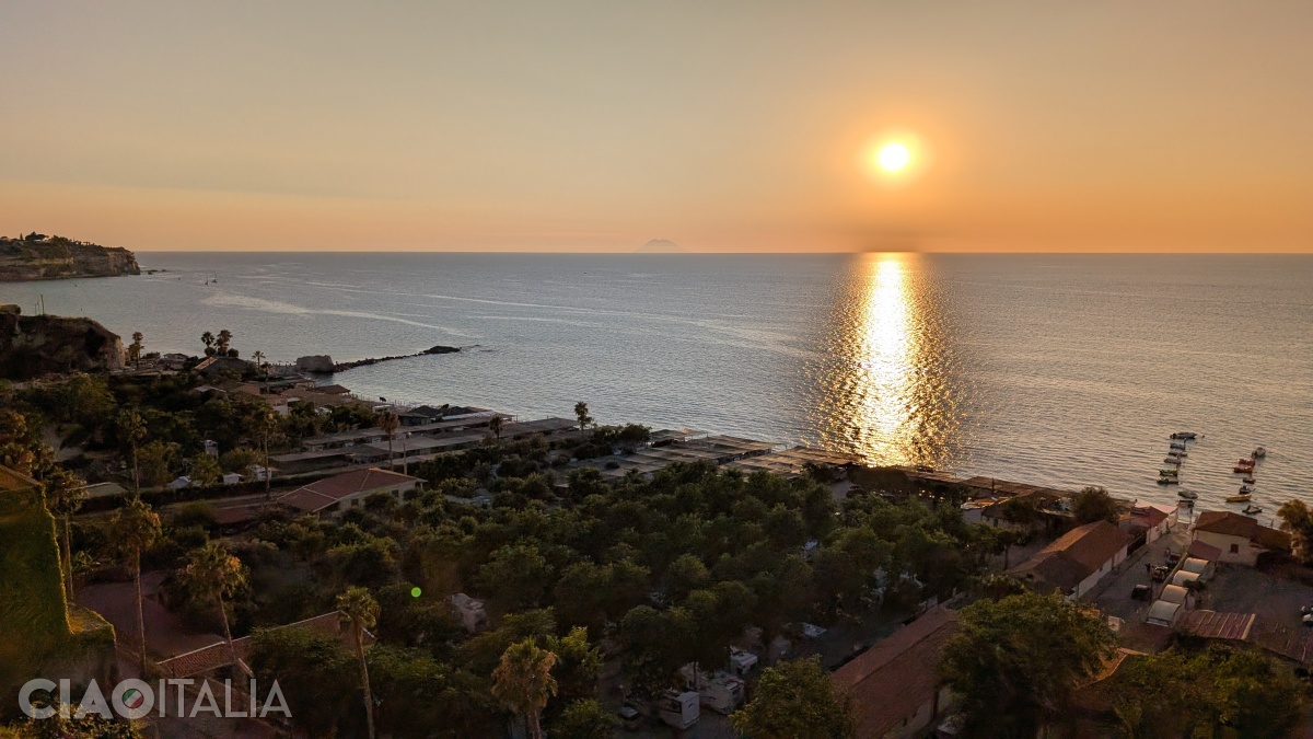 View of the lower part of the town of Tropea. On the horizon, you can see the outline of the volcanic island of Stromboli.