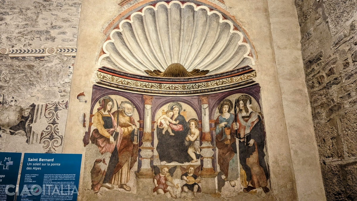 The altarpiece fresco in the Chapel of Saint Lucy (1526): the Virgin with Child between Saint Catherine and Saint John the Baptist on the right, and Saint Lucy and Saint Peter on the left