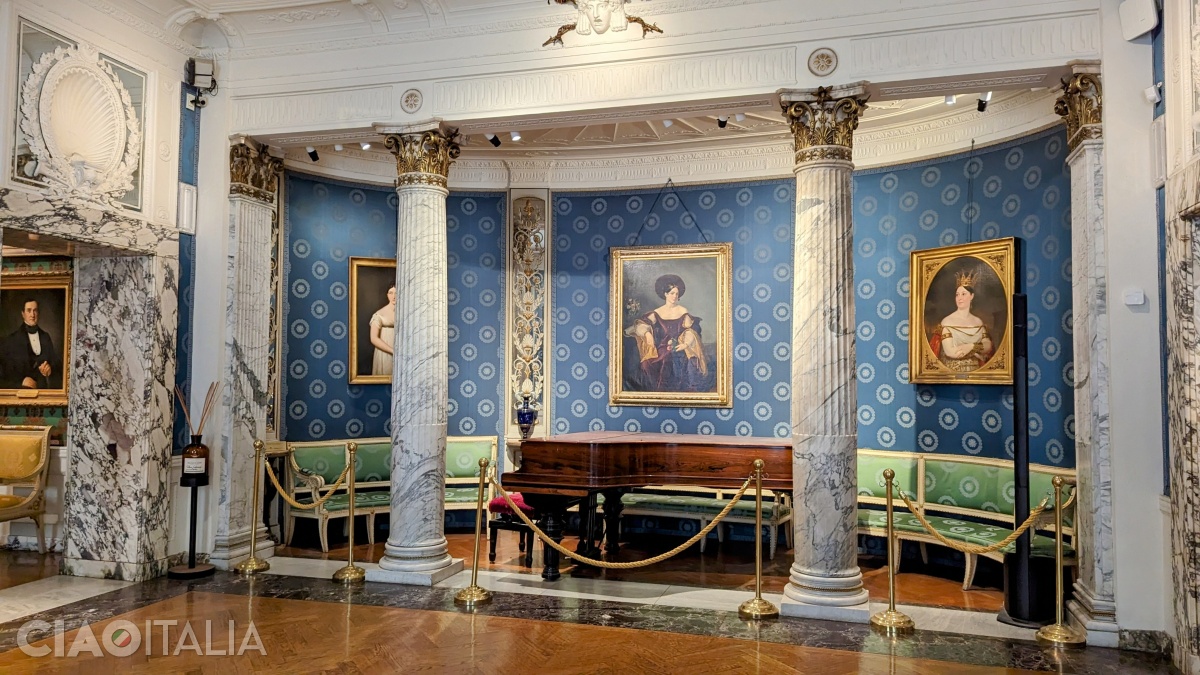 Above the piano is the portrait of Maria Malibran.