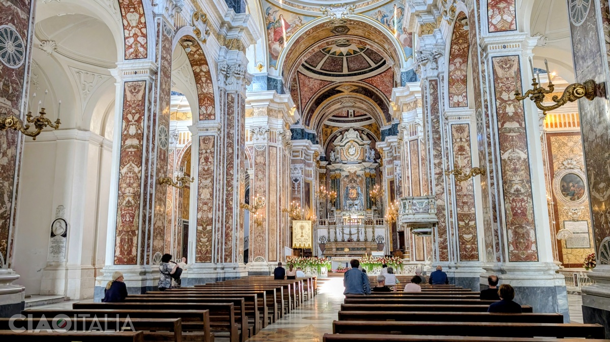 The interior of the church is richly decorated with colored marble.