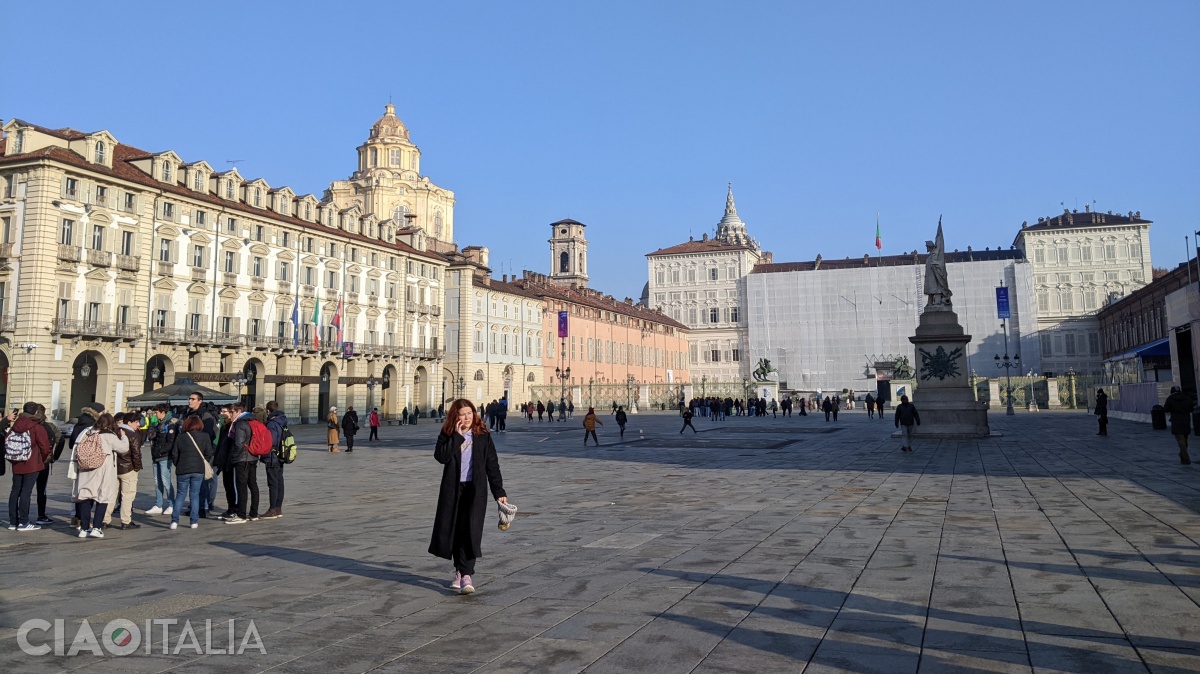 Piazza Castello. From left to right, you can see the dome of the San Lorenzo Church, the bell tower of the Cathedral, the dome of the Holy Shroud Chapel, and the Royal Palace.