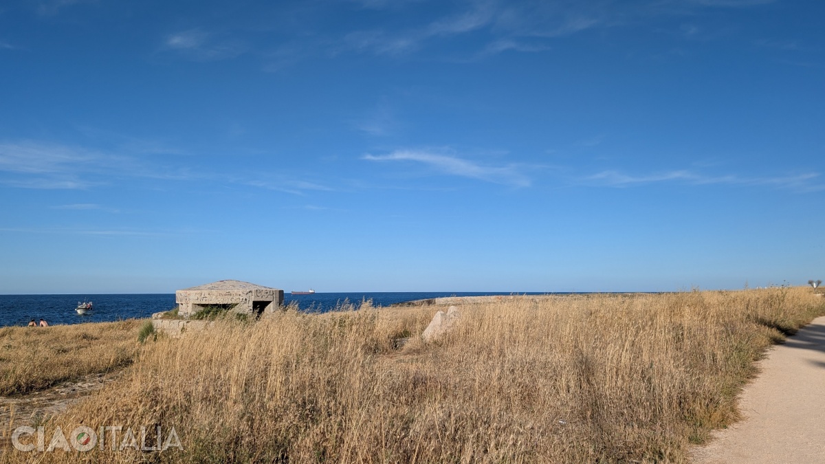 The path to Porto Nero passes by an old concrete bunker.