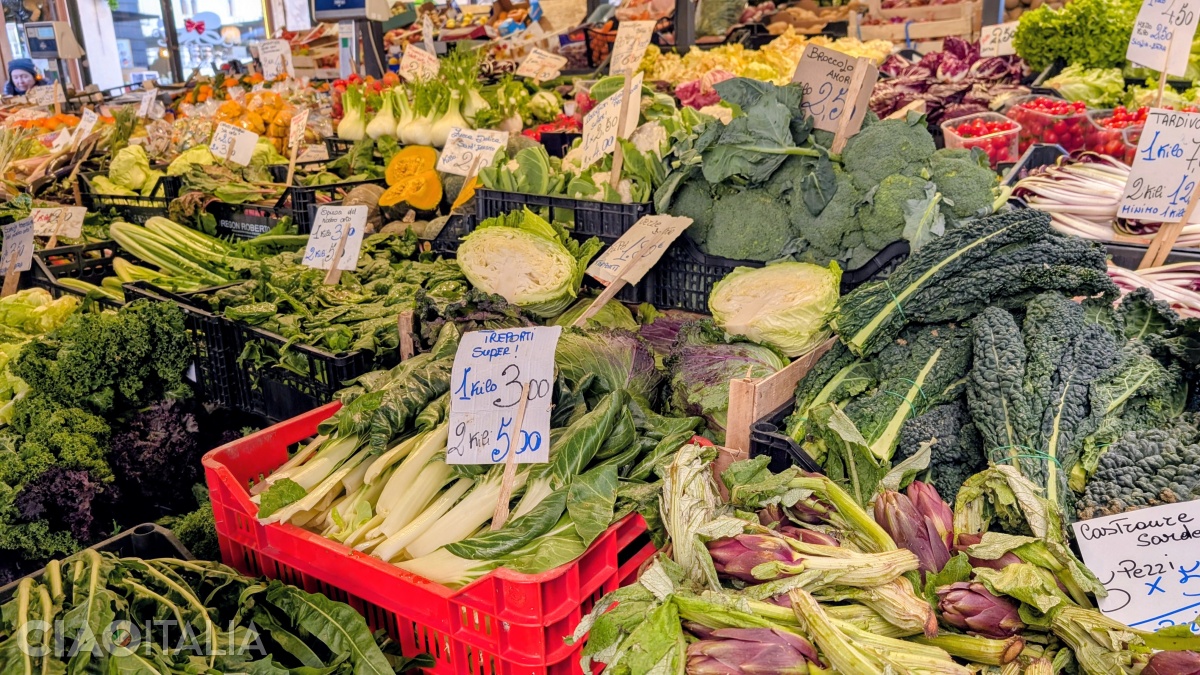 Walk among the stalls and admire the colorful fruits and vegetables.