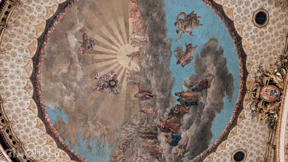 The ceiling painting is an allegory of poetry.