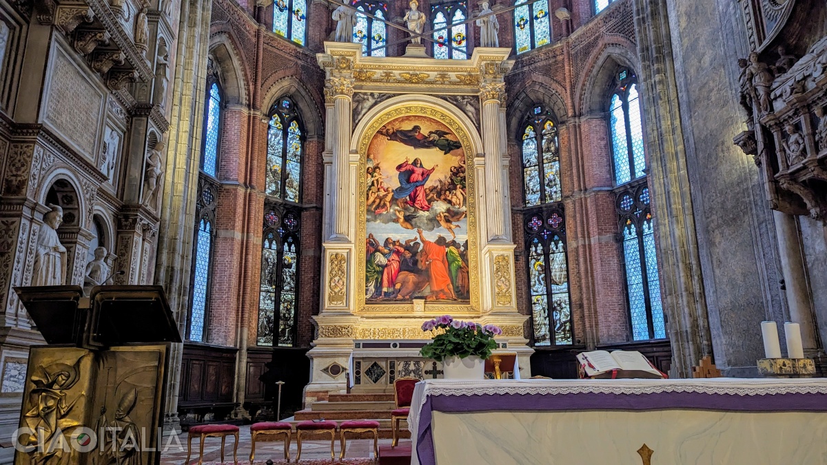 Titian's "Assumption of the Virgin" is located above the main altar in the Basilica dei Frari.