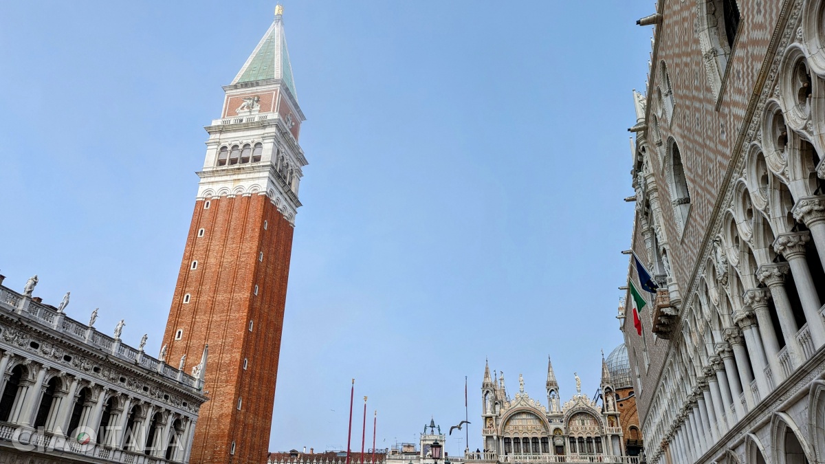 On the sides of the tower, just below the roof, are depicted the Lion of St. Mark and Justice.