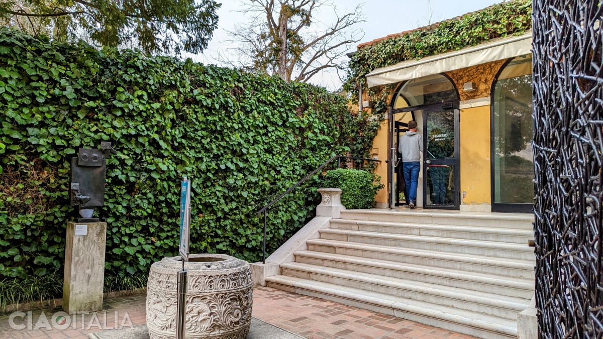 To the left of the entrance is the bronze sculpture by Max Ernst.