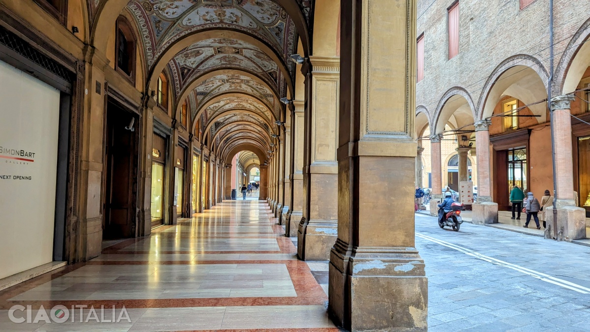 It is said that you can walk for hours through Bologna without being bothered by the rain.