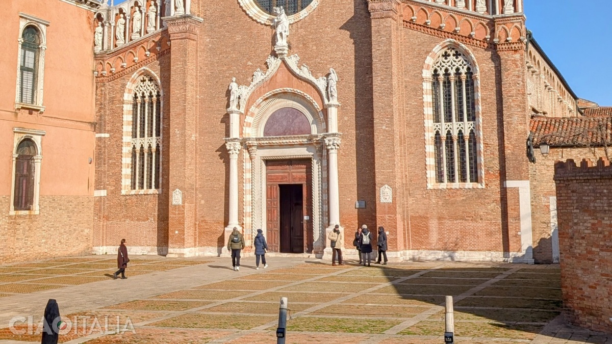 The traditional paving of old Venice is still preserved in the small square in front of the church.