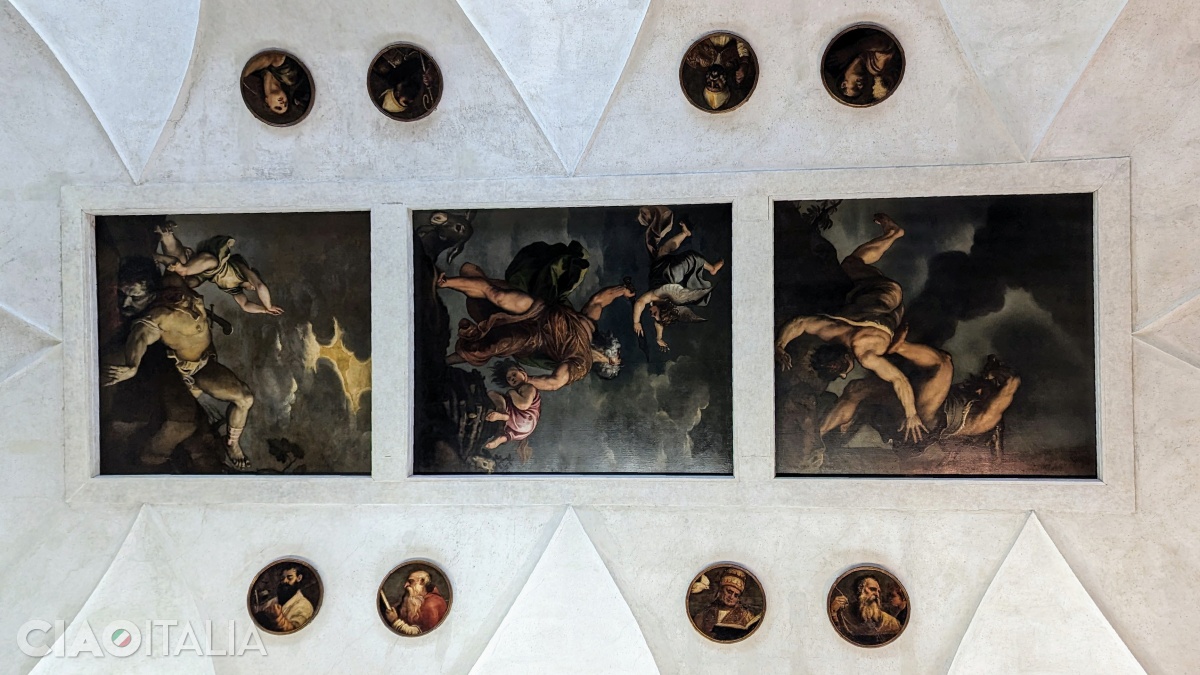 On the ceiling of the sacristy are three paintings by Titian.