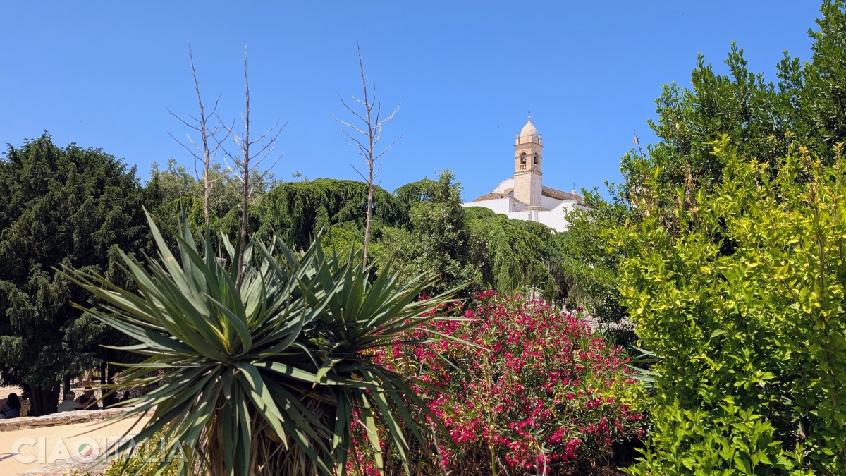 The Church of Santa Lucia rises above the park.