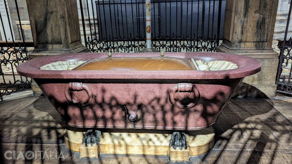 The Roman tub made of Egyptian porphyry is used as a baptismal font