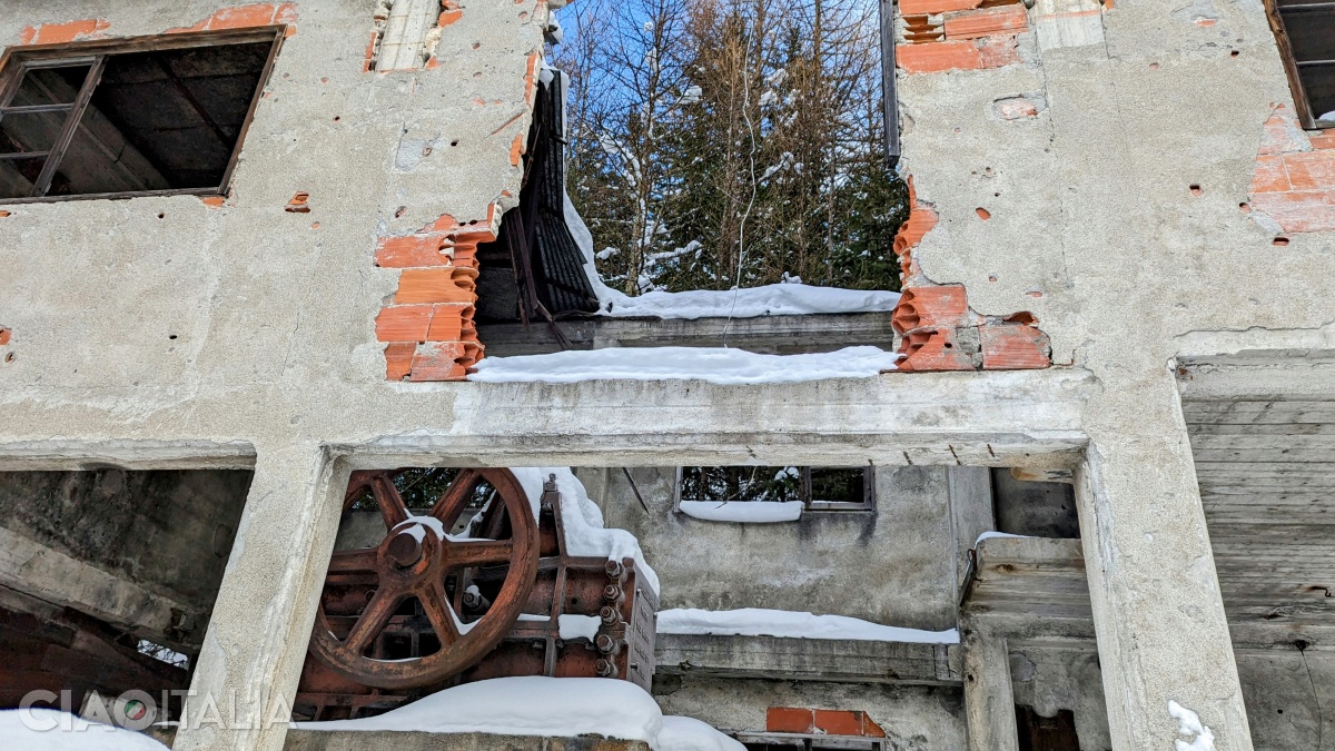 The ruined buildings still preserve the old machinery.