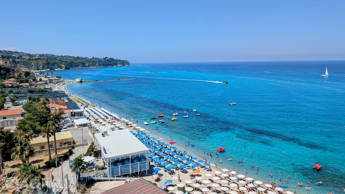 Mare Grande Beach stretches to the left of the Sanctuary of Santa Maria dell'Isola.