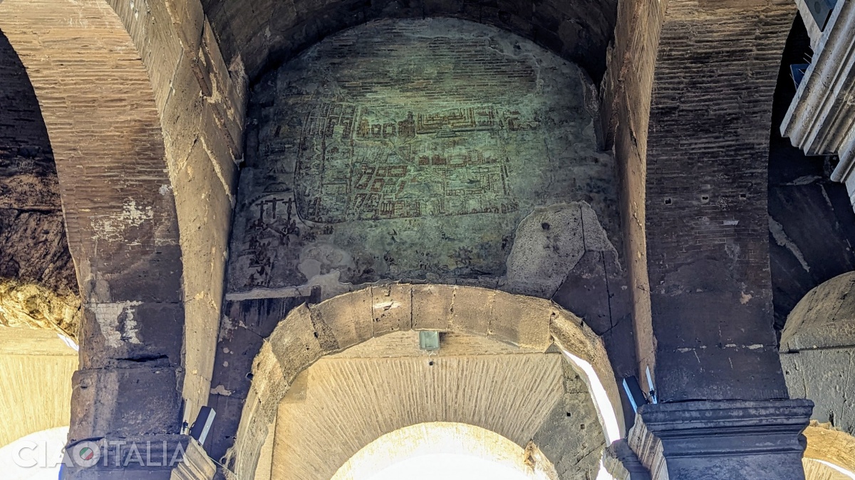 The depiction of the city of Jerusalem is located on the arch of the gate on the inner side of the Colosseum.