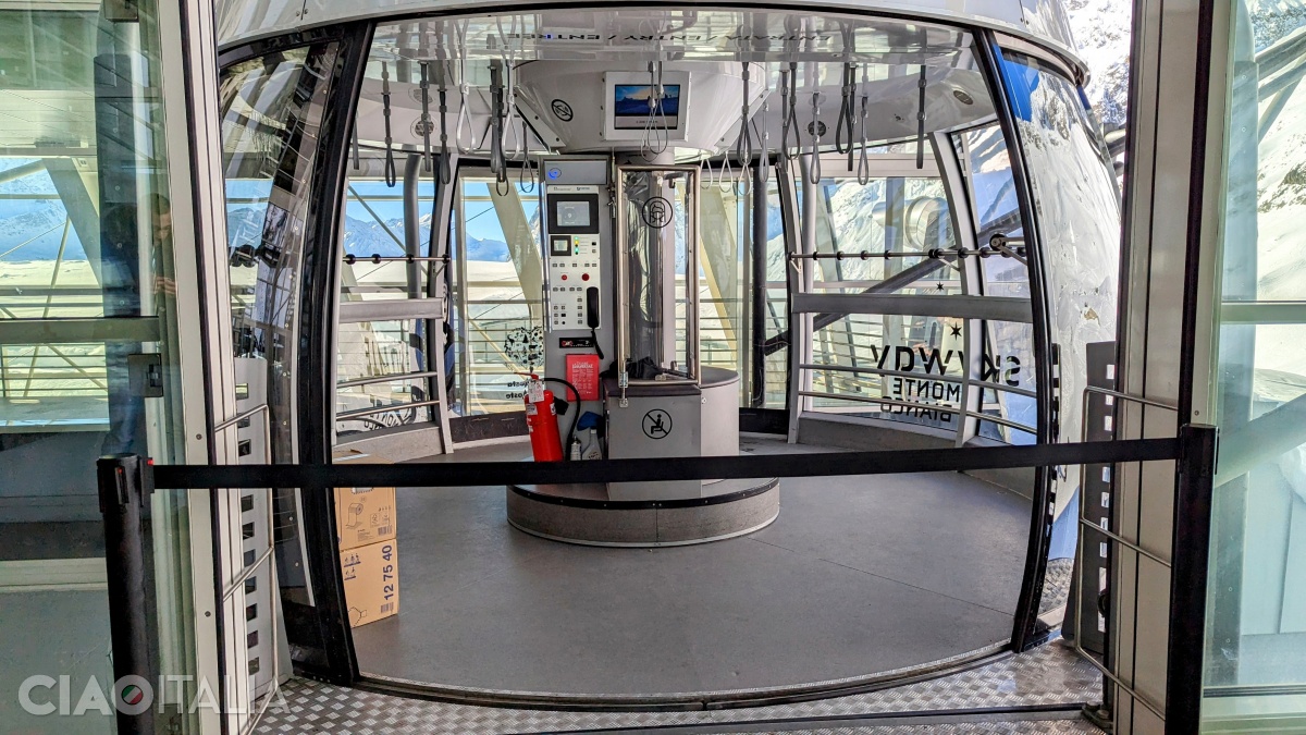 The Skyway cable car has a round base and rotates slowly during the ride.