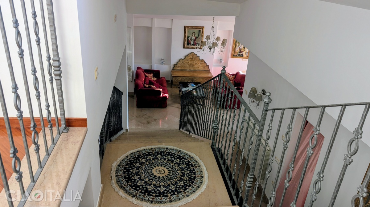 On the lower floor is the lounge, and upstairs are the few guest rooms.