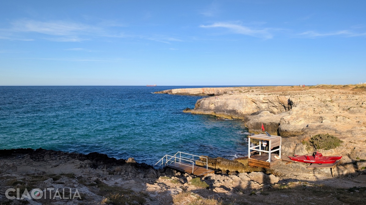 Porto Nero is a rocky beach, with access to the water provided by a ladder.