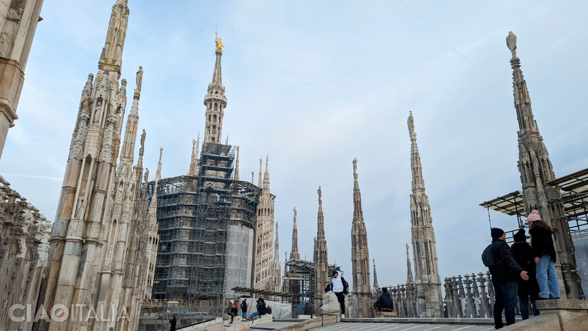 On the roof, at the top of the highest spire of the Cathedral, stands the gilded statue of the Virgin