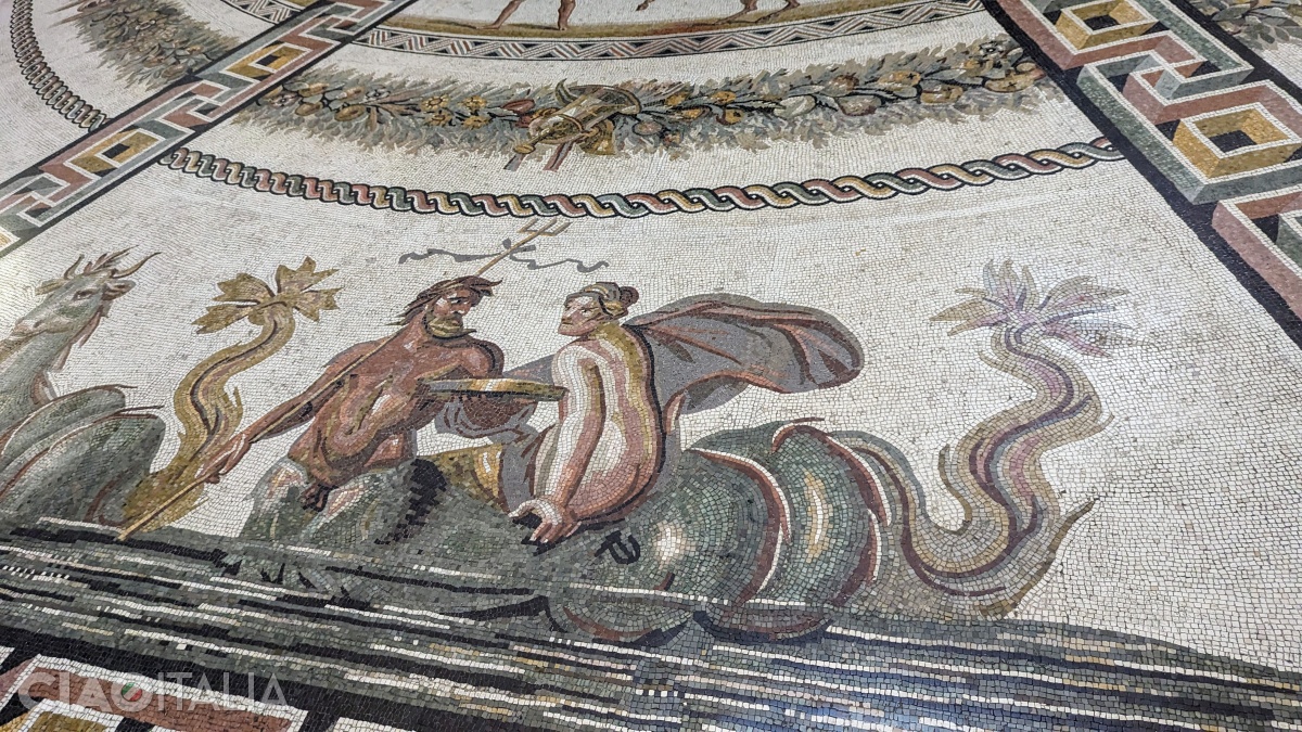 The floor features 3rd-century mosaics.