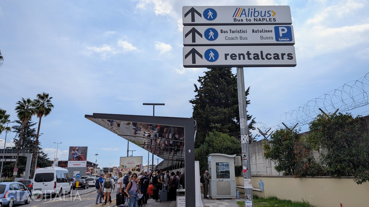 In the airport there are signs pointing to the Alibus stop.
