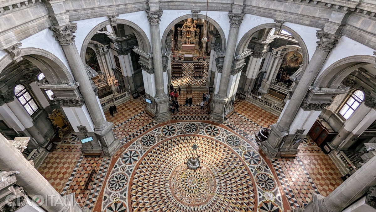 The floor of the Church of Santa Maria della Salute is covered with polychrome marble.