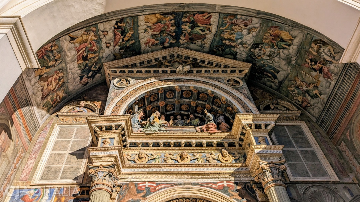 The Renaissance entrance, with frescoes and terracotta statues