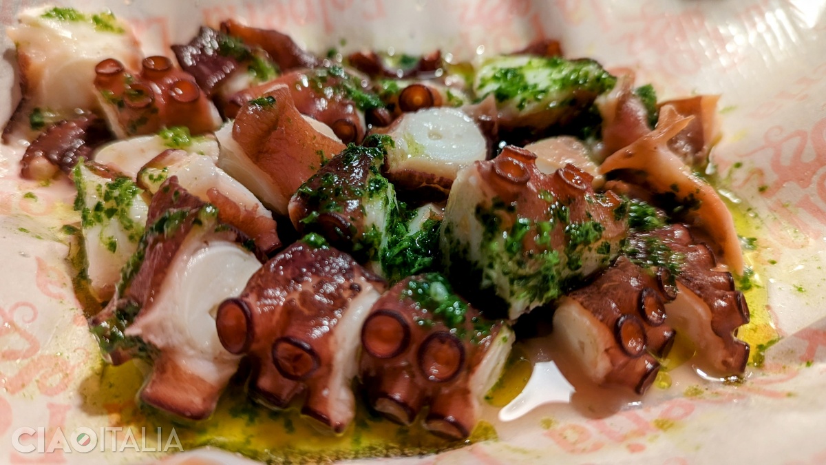 Tender and delicious pieces of octopus with green sauce