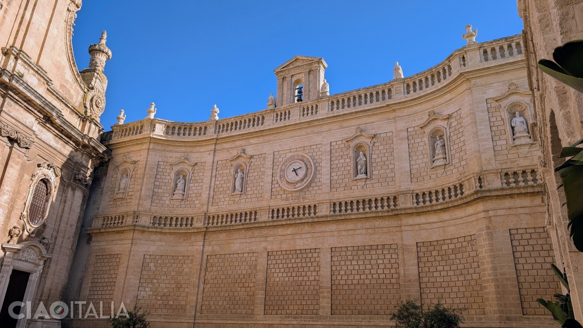 The wall to the right of the church was built to shelter the people from the wind.