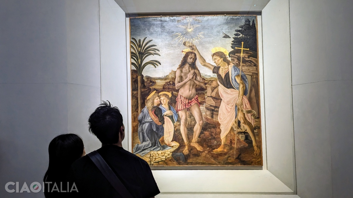 Andrea Verrocchio - "The Baptism of Christ" (1470–1475). Leonardo painted the head of the angel on the left and the landscape.