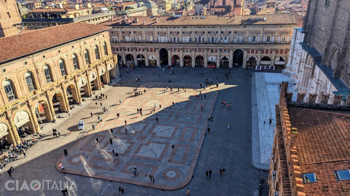 Piazza Maggiore seen from the City Hall Palace. From left to right: Palazzo del Podestà, Palazzo dei Banchi, the façade of the Basilica of San Petronio, and a corner of the Palazzo dei Notai.