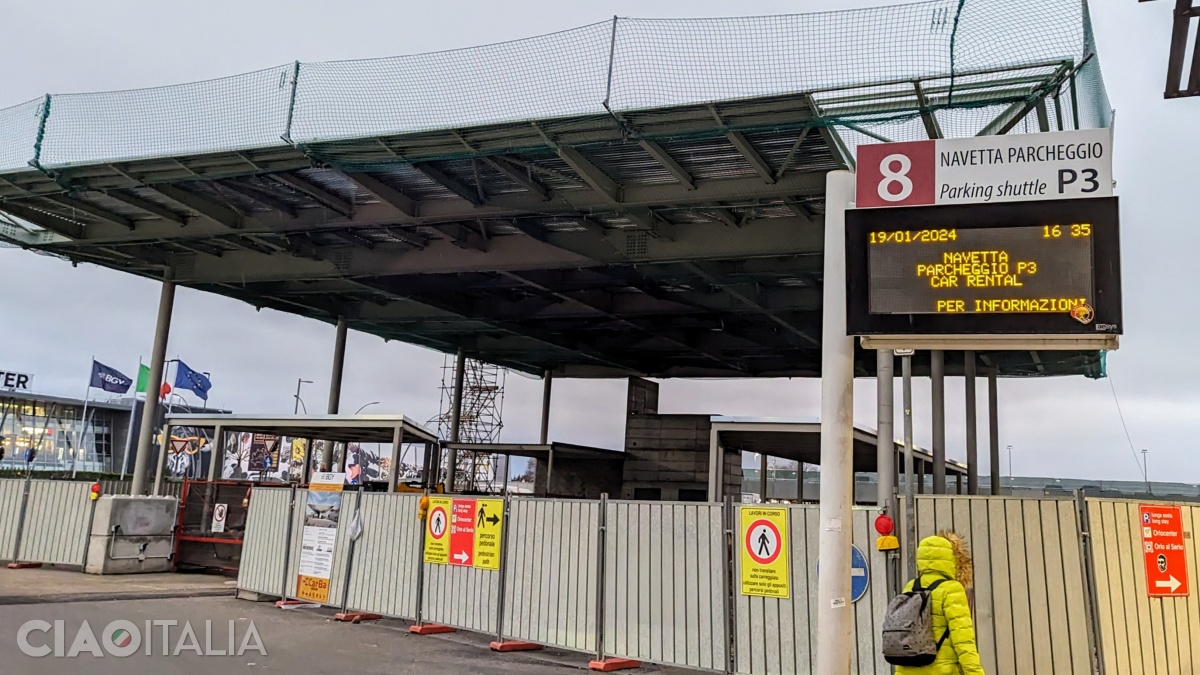 To reach the rent-a-car parking area, you will need to take a free shuttle bus from platform 8.