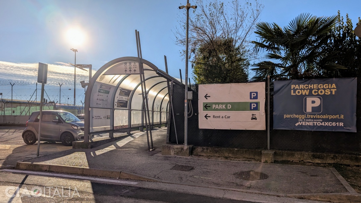 After you exit the terminal, turn left toward the covered walkway.