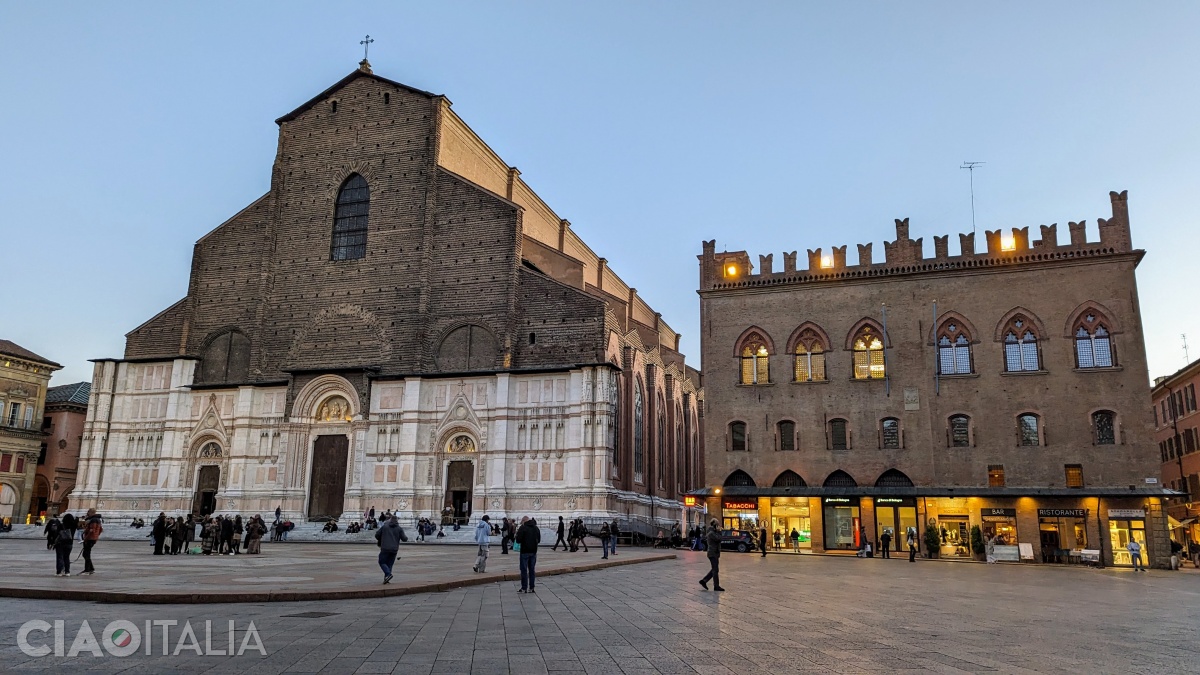 The Palace of the Notaries is located to the right of the Basilica of San Petronio.