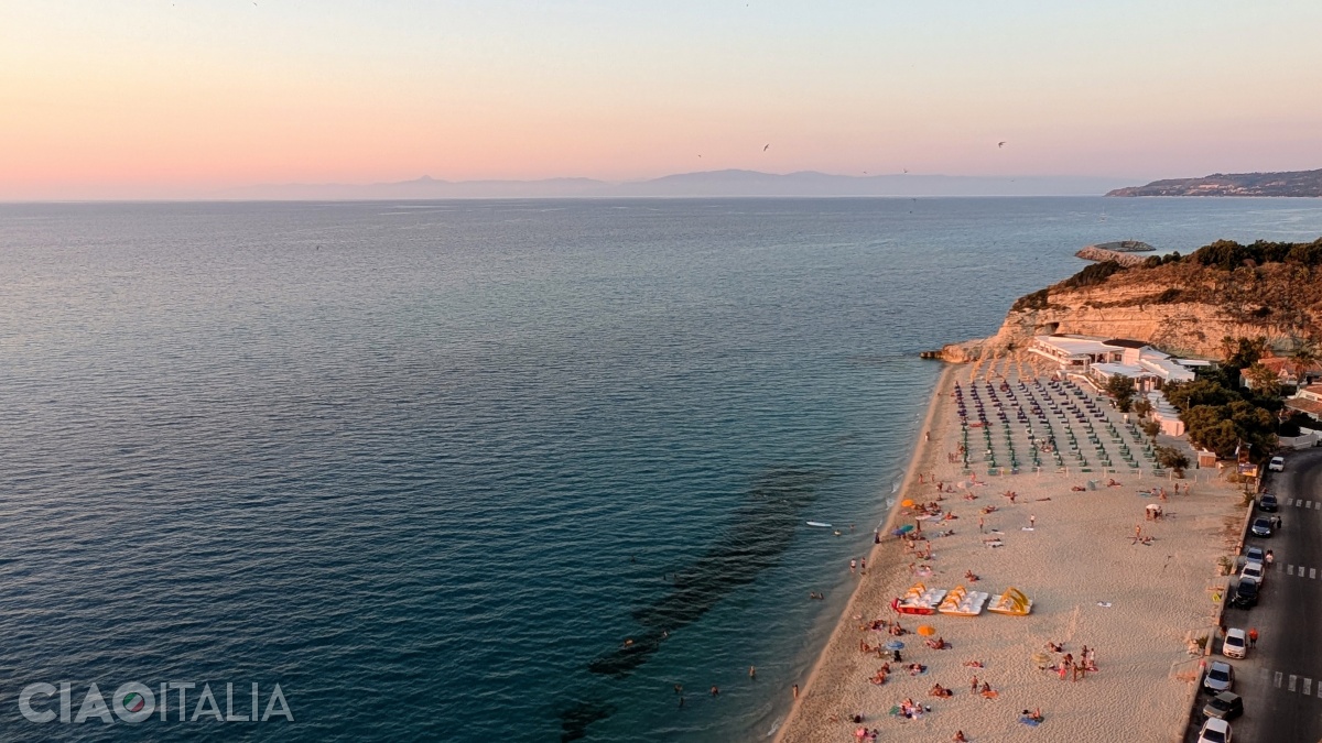 To the right, you can see Rotonda Beach, bordered by the San Leonardo rock.