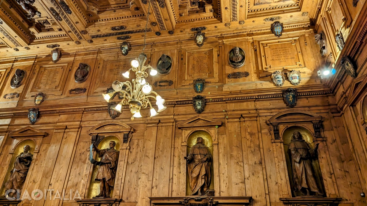 The second statue on the left represents the physician Hippocrates.