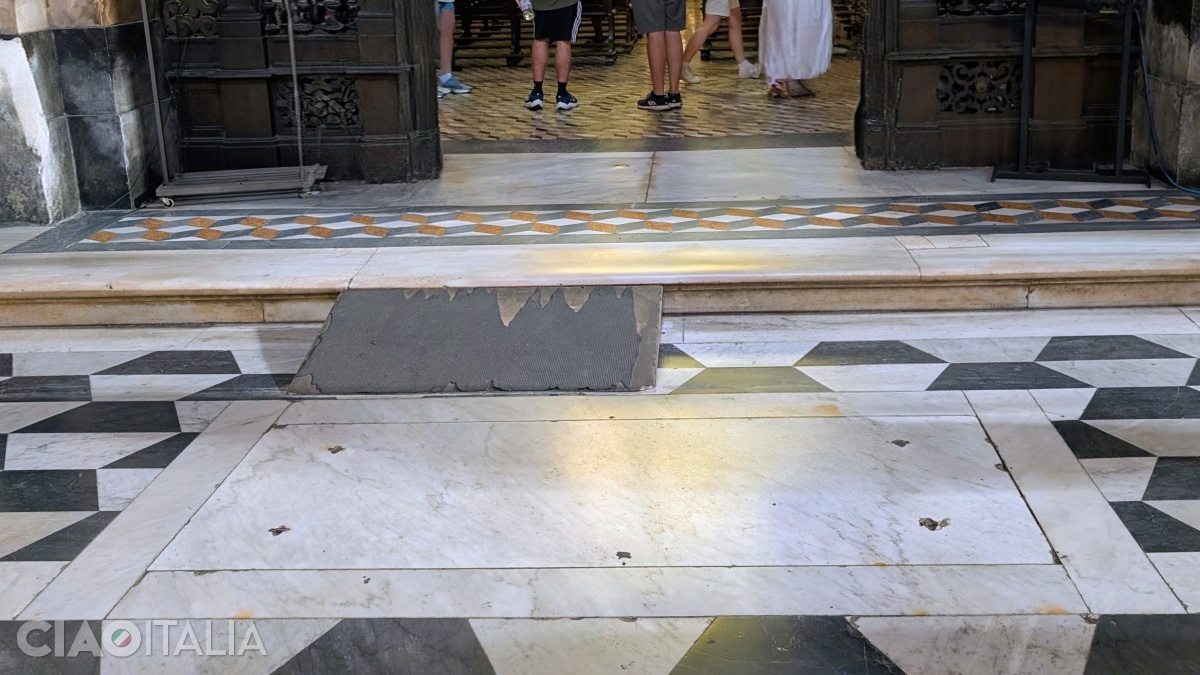 The slab beneath which, according to tradition, lies the tomb of the painter Domenichino