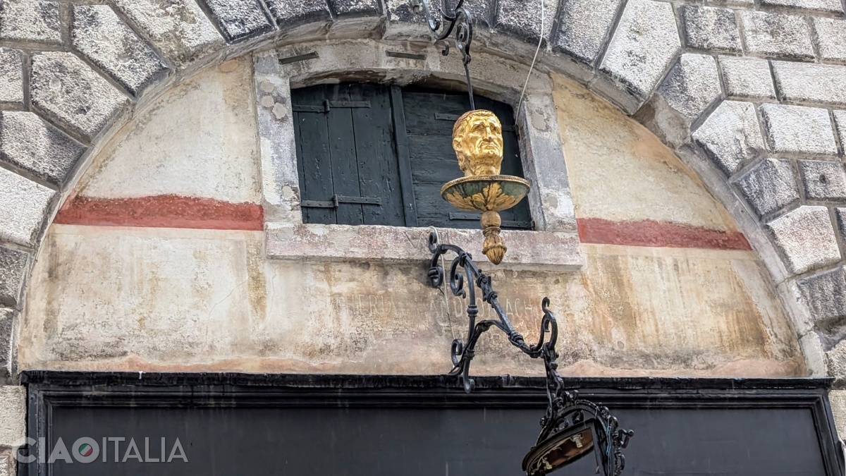 Beneath the window, an inscription can be seen.