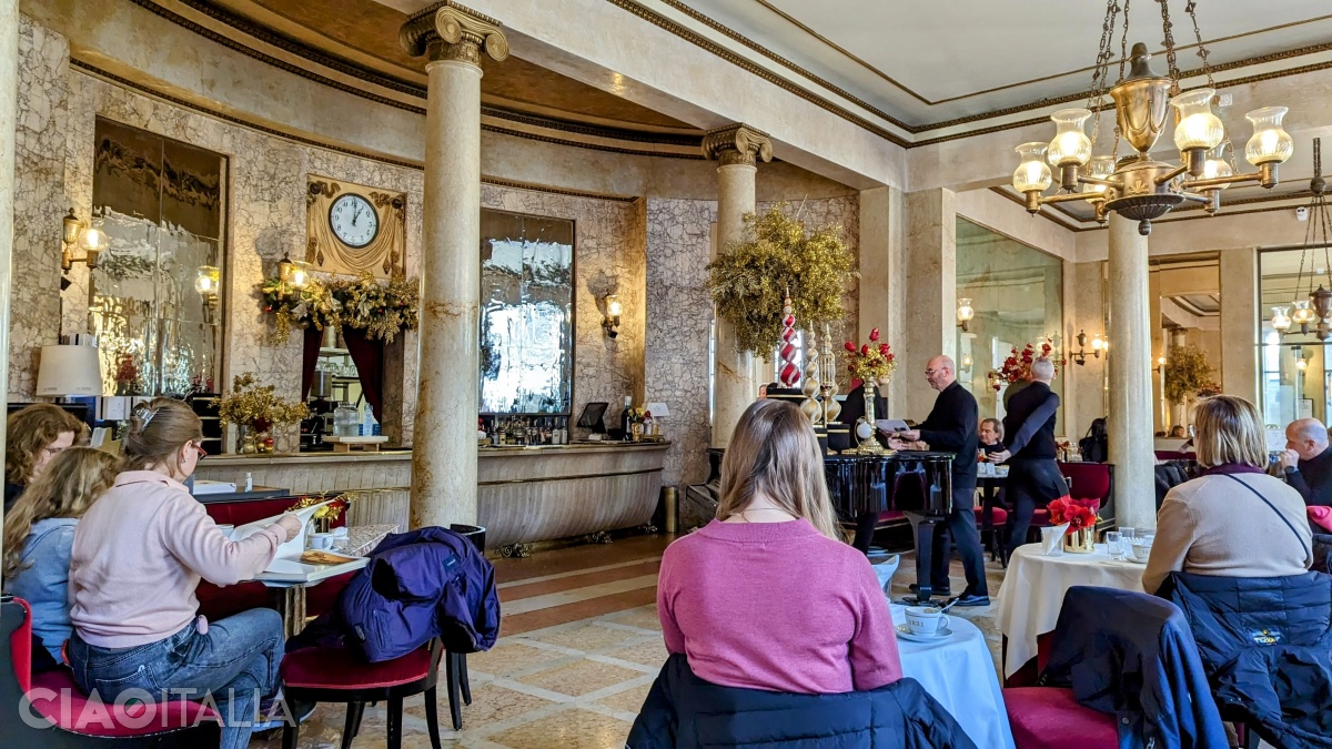 The Red Room, which preserves the original marble counter, is the heart of the caf&eacute;.