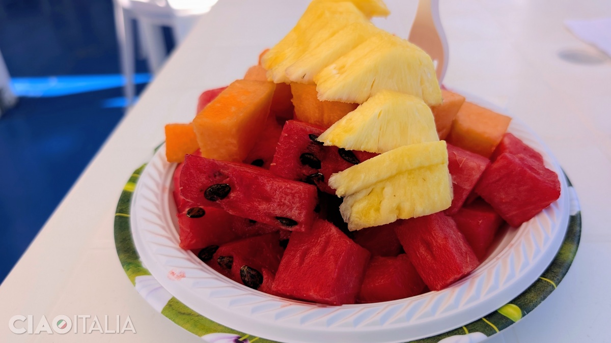 A refreshing plate of fruit on the beach in Scilla