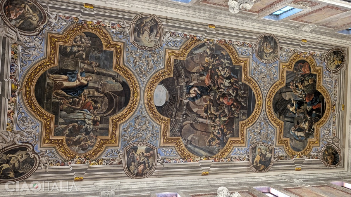 The paintings on the ceiling of the central nave