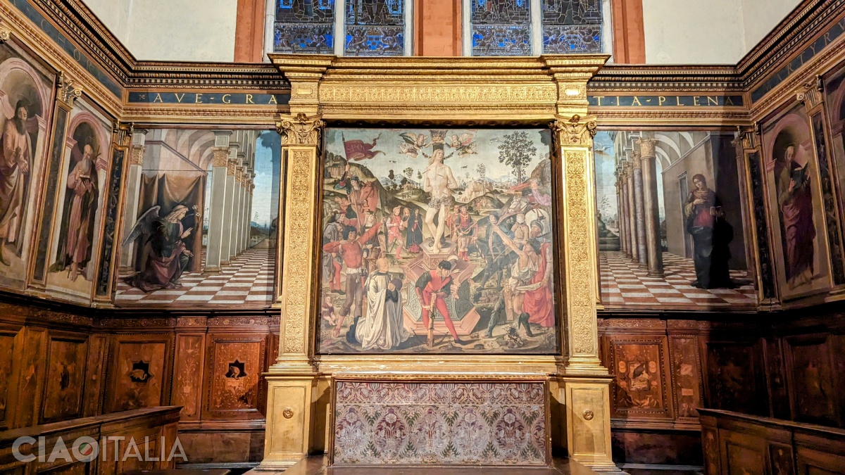 The altarpiece painting depicts the martyrdom of St. Sebastian.