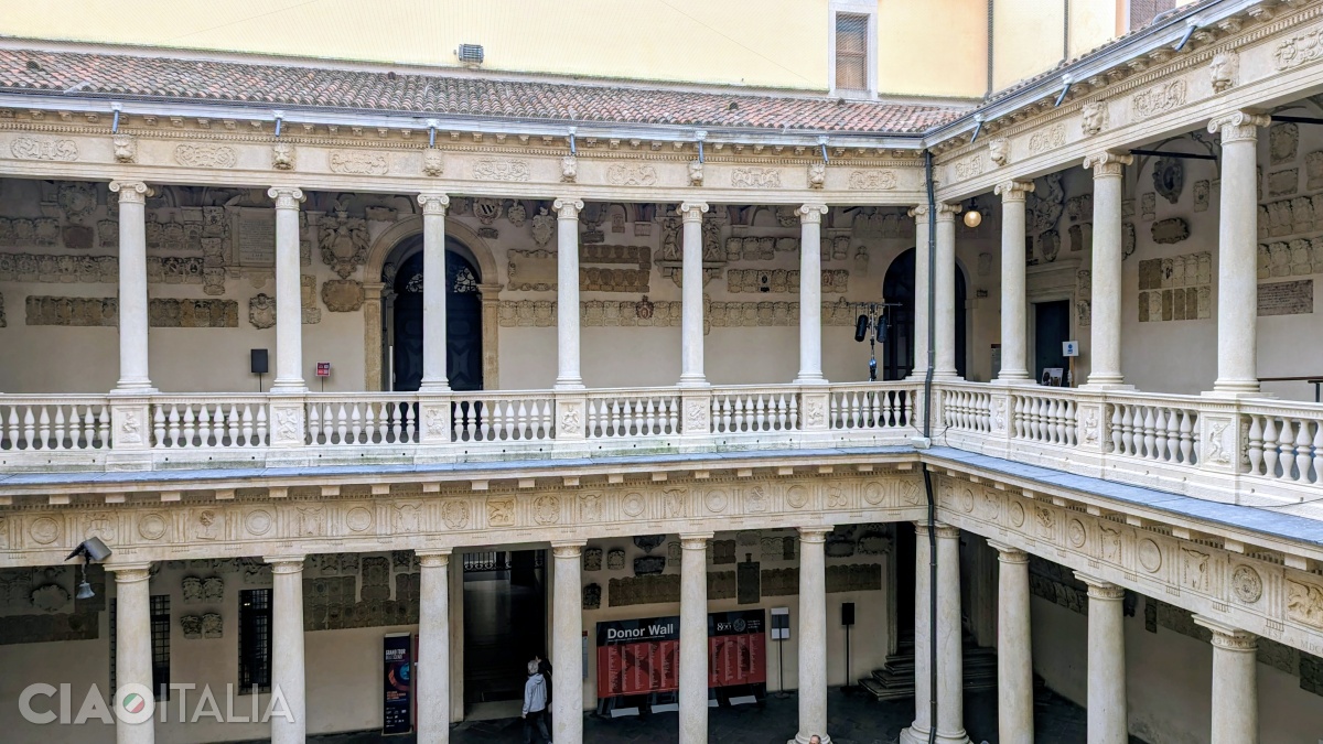 The old courtyard is surrounded by a two-level loggia.