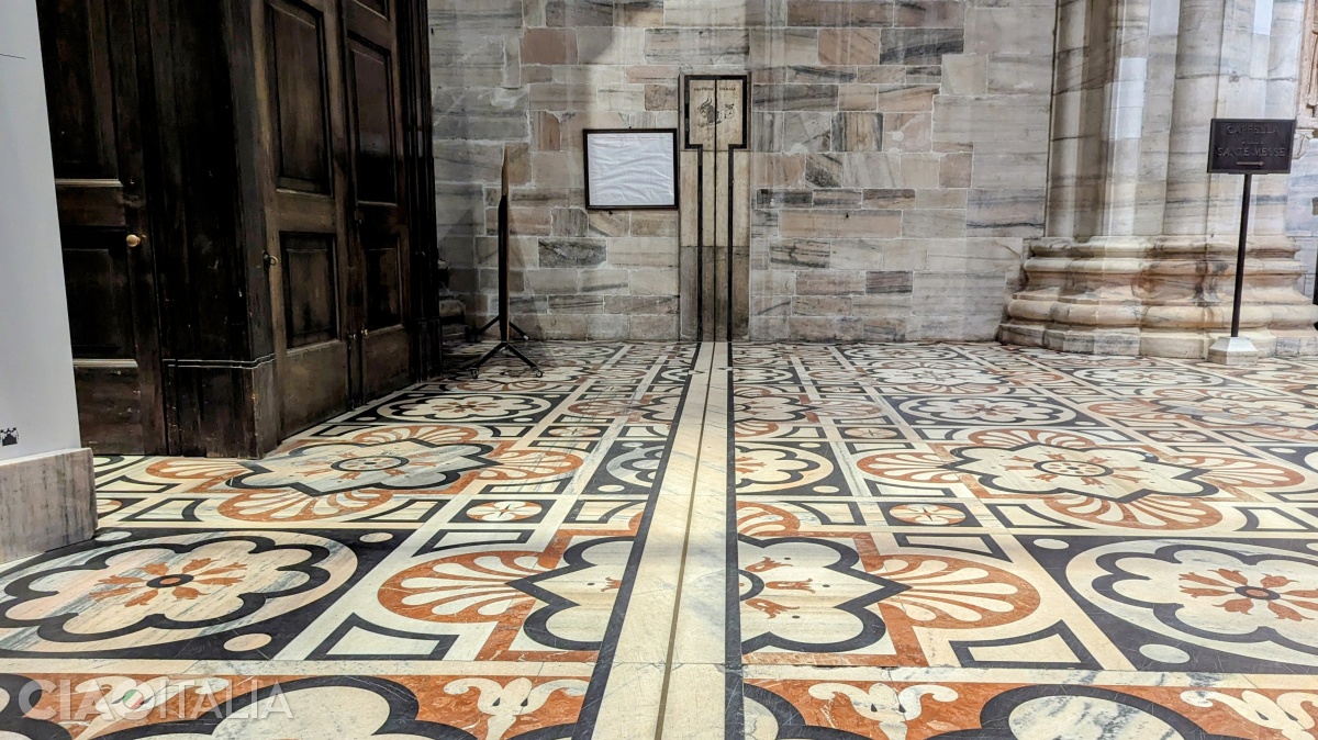 The meridian line continues on the left wall of the Cathedral.