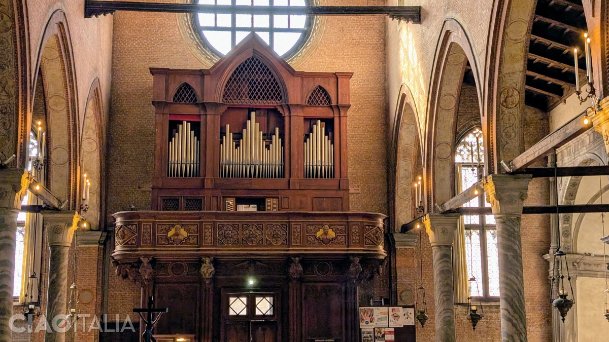 The 19th-century organ is located above the entrance to the church.